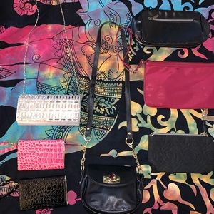 Bundle of clutches and wristlets and make up bag
